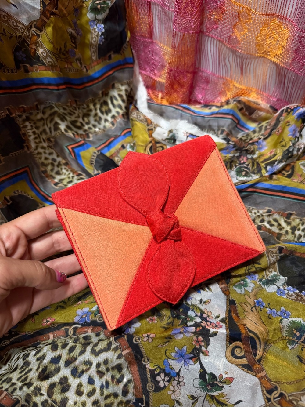 Red & Peach Knot Accent Envelope Clutch from Sony pictures costume dept